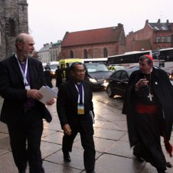 Hurry, hurry: myself, Bishop Efraim Tendero and Kurt Cardinal Koch running in Lund