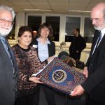 Women in prison in Azerbaijan produced this impressive tapestry with the symbol of justice for me as President of ISHR. The Chair of ISHR Azerbaijan presents it me (2015)