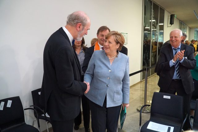Photo: With chancellor Angela Merkel