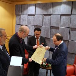 The Albanian President receiving the life membership of the Royal Academy from Thomas Schirrmacher, with HIRH Prince Gharios El Chemor of Ghassan Al-Numan VIII and Sheikh Selim El Chemor.