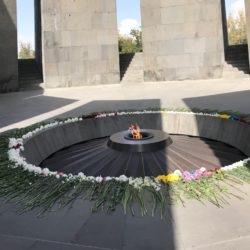 Thomas Schirrmacher kneels at the Armenian Genocide Memorial Complex Tsitsernakaberd in Yerevan © BQ/Schirrmacher