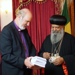His Holiness Patriarch Abune Mathias receives books of the WEA from Thomas Schirrmacher © BQ/Schirrmacher