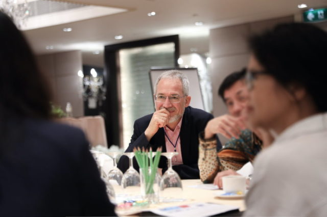 Prof. Dr. Christof Sauer listening to human rights defenders in Asia © SEAFORB
